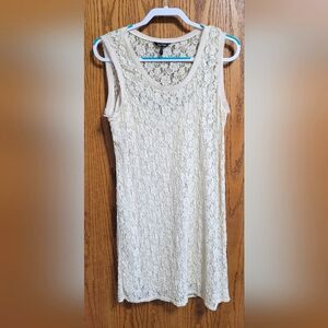 Fully lined lace sundress.